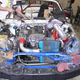 Illustration for article titled Eyesore Racings Ghettocharged Miata Fears No Turbocharged Peugeot Surrender Monkeys!